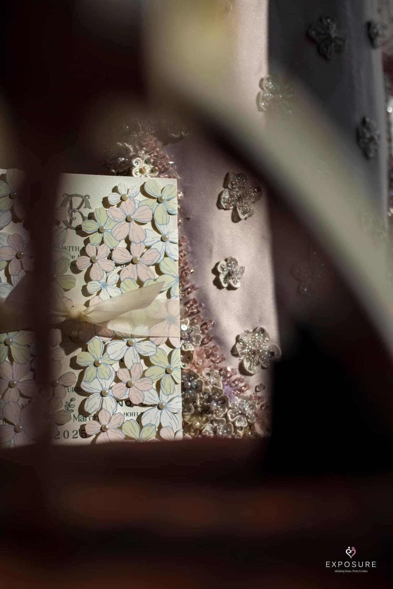 Layered floral paper details with pearl and beaded finishes